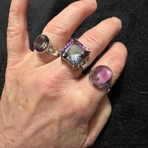 Silver (925) Rings. 
3 Rings. 
1 Amethyst 
2 Mystique Topaz
Beautiful Collection